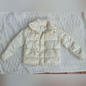 Moncler Off-White Quilted Puffer Jacket Details of the garment in photos and des